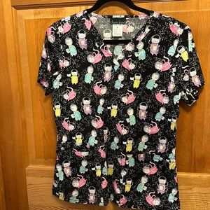 Woman’s scrub top cats in outer space. Healthcare